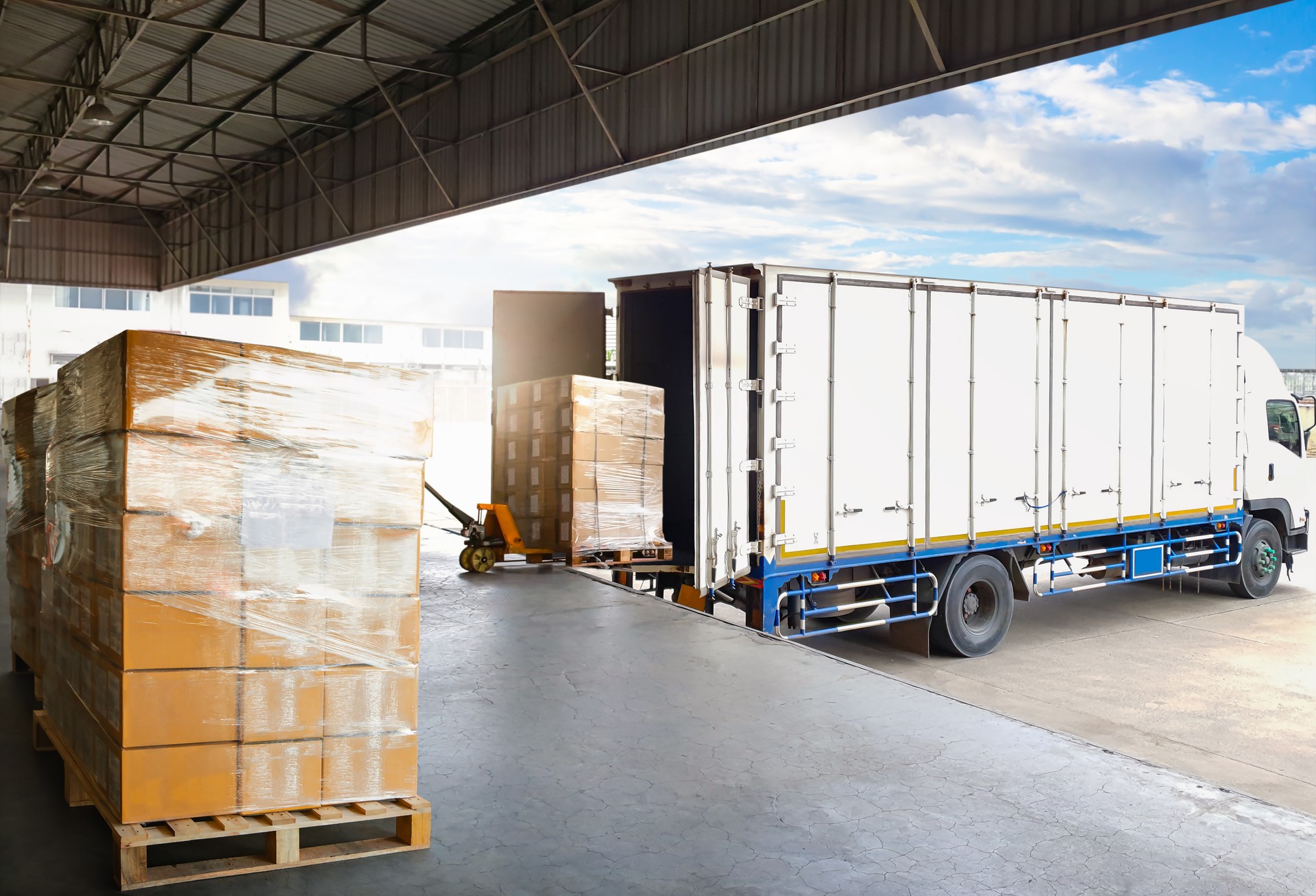 Container Trucks Parked Loading Package Boxes Pallets at Warehouse Dock. Supply Chain, Distribution Warehouse Shipping, Supplies Shipment Boxes. Freight Truck Logistic, Cargo Transport.